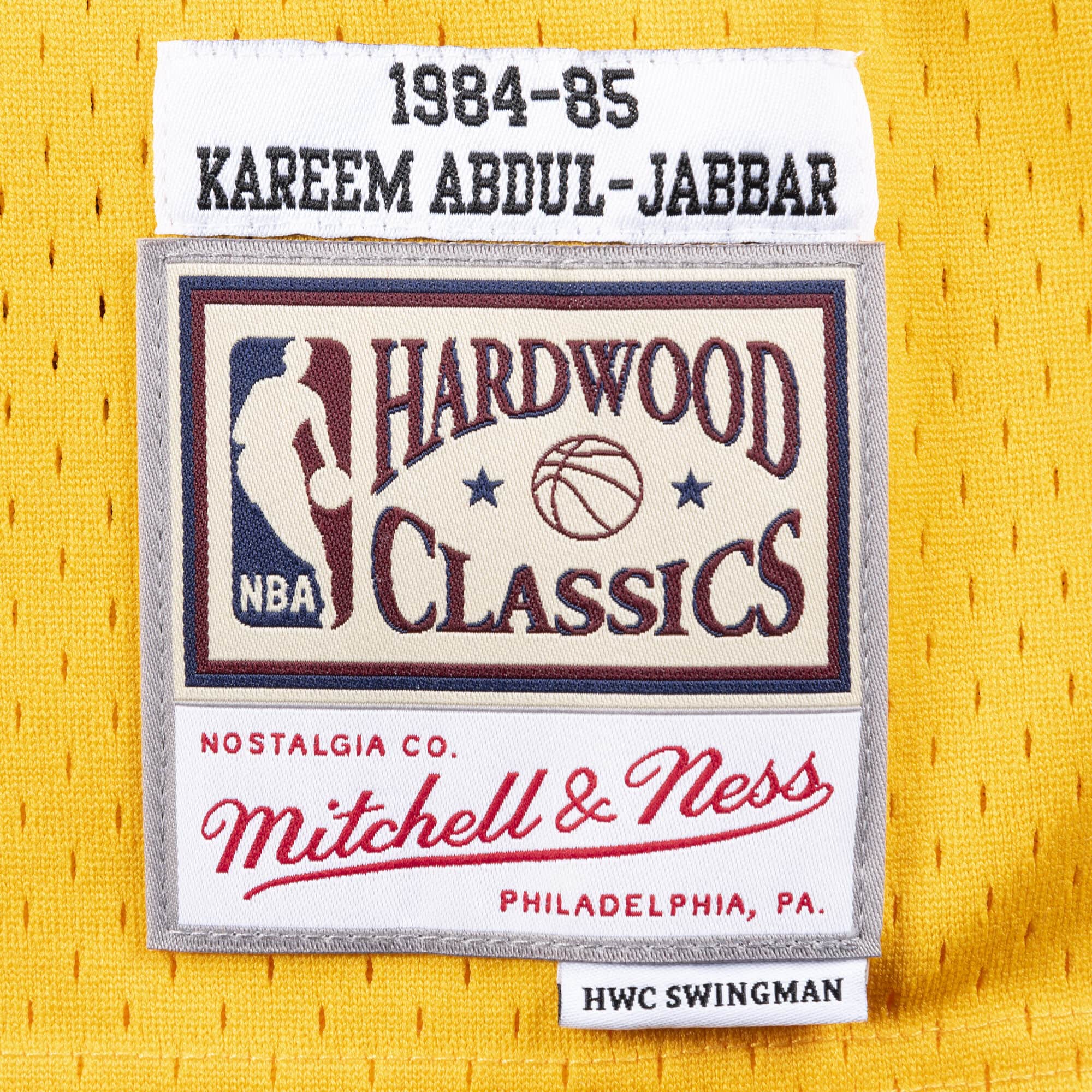 Mitchell and Ness: Canotta Kareem Abdul Jabbar  Los Angeles Lakers, 1984/85 yellow